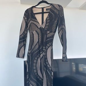 Black, lace dress in size small. Worn once, great condition. Akira brand.